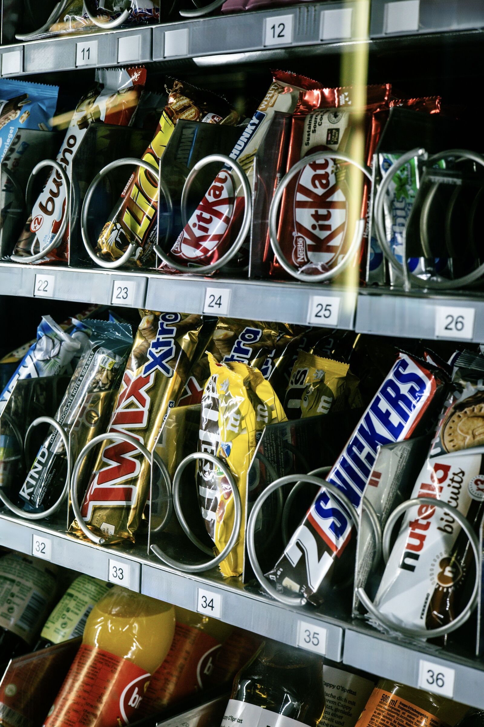 Snack vending machine fully stocked with chocolate and snack bars